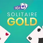 Texten Solitaire Gold på en turkos bakgrund med spelkort runt omkring