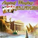 En illustration av antika underverk med statyer, tempel och spelkort med texten Ancient Wonders Solitaire