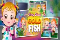 Wow!! Baby Hazel är glad över att ha en guldfisk som lyckligtvis ramlar från