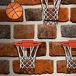 En tegelvägg med tre basketkorgar och en basketboll