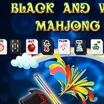 Färgglada mahjongbrickor mot en blå bakgrund med texten Black and White Mahjong 2 och en magisk hatt med regnbågsfärger
