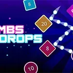 Färgglada geometriska former och siffror på en mörk bakgrund med texten Bombs Drops