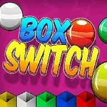 Färgglada bollar och block samt texten BOX SWITCH mot en lila bakgrund