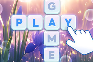 En handpekar på korsade bokstavsbrickor som bildar orden PLAY och GAME mot en bakgrund av lila blommor och mjukt ljus