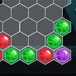 Färgade sfärer med röda, gröna och lila nyanser arrangerade på ett hexagonalt rutnät