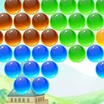 Färgglada sfäriska bubblor arrangerade i rader över ett landskap med mjuka kullar och ett hus i bakgrunden