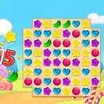 Färgglatt pusselspel med godisbitar i form av hjärtan, stjärnor och rundor framför en blå himmel och regnbåge