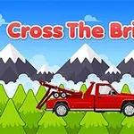 Röd bärgningsbil framför berg och granar med texten Cross The Bridge ovanför