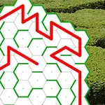 Röd zickzacklinje över hexagonalt rutmönster med en bakgrund av gröna buskar