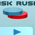 Texten DISK RUSH visas ovanför en blå och en röd skiva med en spelknapp nedanför