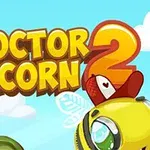 Tecknad bild med texten Doctor Acorn 2 och en gul bikupa med stora ögon, samt träd och moln i bakgrunden