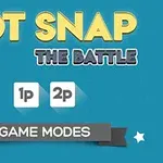 Texten Dot Snap The Battle visas med två knappar med texten 1p och 2p under, samt en banderoll med Game Modes på blå bakgrund