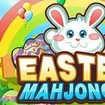 En tecknad kanin med stora ögon sitter ovanpå färgglada påskägg framför en regnbåge och ballonger, med texten Easter Mahjongg nedanför