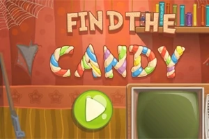 Texten Find the Candy i färgglada bokstäver på en vägg med en spindelväv och en bokhylla