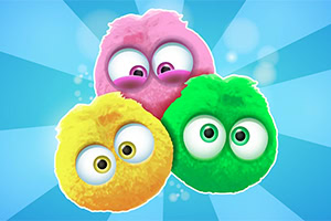 Tre färgglada, fluffiga bollar med stora ögon mot en blå bakgrund