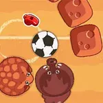 Två tecknade djur, en sköldpadda och en flodhäst, omger en fotboll på en beige plan med röda block runtomkring