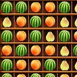 Vattenmeloner, persikor och päron arrangerade i ett rutnät