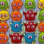 Färgglada, tecknade monster i rader på ett rutnät med olika ansiktsuttryck