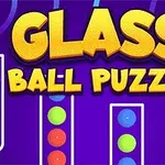 Färgglada bollar i rör med texten Glass Ball Puzzle mot en lila bakgrund