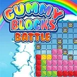 Färgglad blocklayout med regnbåge och moln, titeln Gummy Blocks Battle i toppen
