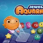 Tecknad orange fisk med stora ögon omgiven av färgglada undervattensvarelser på en spelbräda med texten Jewel Aquarium ovanför