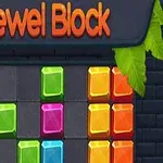 Färgglada block i olika former på en mörk bakgrund med texten Jewel Block ovanför