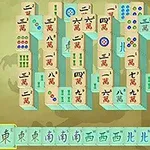 En uppsättning av mahjong-brickor mot en beige bakgrund med en drakskugga