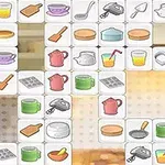 Uppsättning av brickor med olika köksrelaterade ikoner som kastruller, koppar, och köksredskap