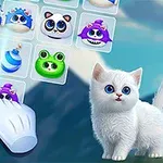 En tecknad bild med ett gulligt, vitt kattunge och färgglada djurikoner på ett rutnät