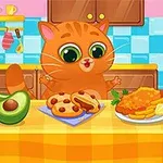 En tecknad orange katt med stora ögon sitter vid ett köksbord med en gul duk, omgiven av avokado, bakverk och en tallrik med mat