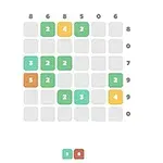 En spelplan med numrerade färgade block i grönt, orange och gult ordnade på ett rutnät