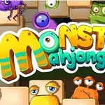 Färgglad text Monster Mahjong omgiven av tecknade monsteransikten med olika uttryck
