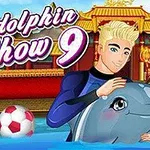 Man håller om en delfin i en pool framför en asiatisk-inspirerad byggnad med texten My Dolphin Show 9 ovanför