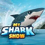 En tecknad haj hoppar ur vattnet med texten My Shark Show framför, mot en bakgrund av berg och himmel