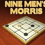Ett spelbräde med svarta och vita spelpjäser på ett trägolv, med texten Nine Mens Morris ovanför