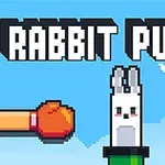 Två tecknade boxhandskar, en röd och en blå, möter ett kaninhuvud från en cylinder, med texten Rabbit Punch ovanför på en blå bakgrund