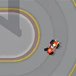 En röd go-kart kör runt en kurva på en asfalterad bana med gula markeringar