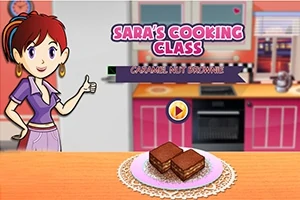Tecknad karaktär i kök med chokladdessert på bordet och texten Saras Cooking Class