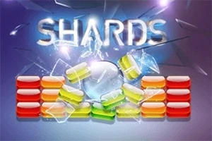 Färgade block och glasskärvor arrangerade med texten SHARDS i bakgrunden
