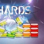 Färgade block och glasskärvor arrangerade med texten SHARDS i bakgrunden