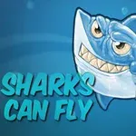 Tecknad haj med stort leende och texten Sharks Can Fly mot en blå bakgrund