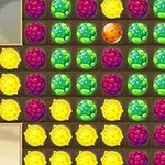 Ett rutnät med färgglada frukter som ser ut som druvor och citroner