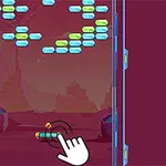 Handpekare rör vid en spelkontroll längst ner i ett rymdtema med färgglada block högst upp på skärmen