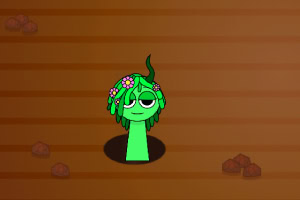 Grön figur med blommor på huvudet som sticker upp ur marken mot en brun bakgrund