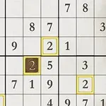 Sudokupussel med numren 1 till 9 i ett rutnät med markerade rutor