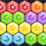 Färgglada hexagonala brickor med olika symboler som blommor, stjärnor och månar
