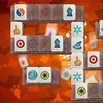 Fyrkantiga brickor med symboler arrangerade på en orange bakgrund