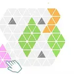 Hand pekar på rosa triangelmönster som ska placeras på ett hexagonalt rutnät med färgade sektioner