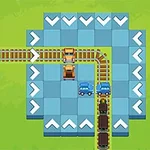 Ett spelområde med blå och vita pilar, järnvägsspår och två blå bilar på grönt gräs