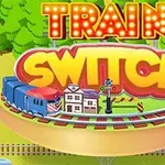 Tecknad bild av en rund tågbana med en blått tåg, ett litet hus och en signal, med texten Train Switch ovanför, omgiven av gröna träd